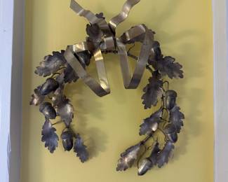 D118 - $30. Brass Wreath with Acorns and Oak Leaves.