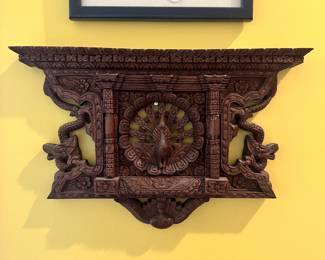D94 - $65. Nepalese Carved Wooden Plaque. Measures 12" wide x 8.5" tall.