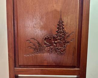 D26 - $30. Carved Wooden Chair. Back Corner is chipped. Otherwise in good condition. Measures 17" floor to seat. 35" tall.