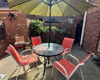 D49 - $65. Patio Table with 4 chairs. In good condition.