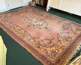 D15 - $125. Area Rug. Measures 127" x 80.5"