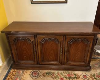 D18 - $125. Solid Wood Buffet. Measures 57.5" wide x 18.5" deep x 30" tall.