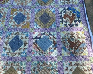 D63 - $125. GORGEOUS Purple Quilt in very good condition. There is some staining on the back side of the quilt.