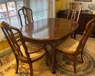 D17 - $250. Dining Table with 6 Chairs. 2 large leaves. Also has table pads. Very good vintage condition (although the chairs could be recovered). Top Measures 53.5" x 41" + 2 - 20" leaves.