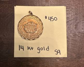 S9 - $450. 14kt gold pendant.