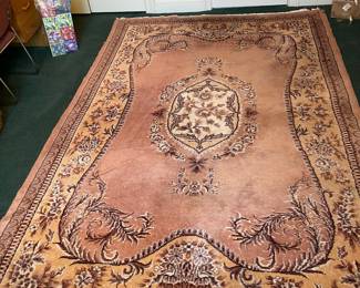 D15 - $125. Area Rug. Measures 127" x 80.5"