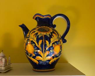 D119 - $10. Decorative Sunflower Pitcher.