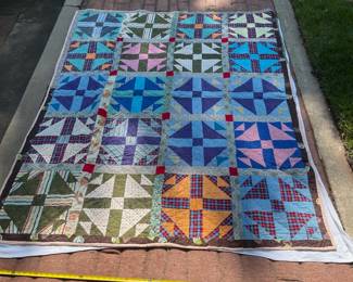 D67 - $95. Hand Pieced Quilt. See Tape Measure in the front of the photo.