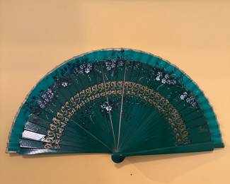 D84 - $20. Decorative Fan used as wall hanging.
