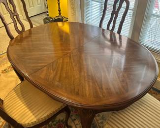 D17 - $250. Dining Table with 6 Chairs. 2 large leaves. Also has table pads. Very good vintage condition (although the chairs could be recovered). Top Measures 53.5" x 41" + 2 - 20" leaves.