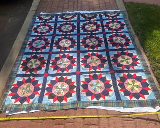 D56 - $95. Antique Quilt. See Tape Measure in front of photo