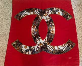 D9 - $150. Chanel Paris Scarf. 100% Seta-Silk. Signature Chanel CC Interlocking Logo Scarf. Does have some staining.