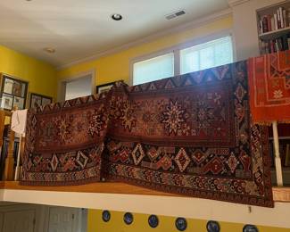 D169 - $250. LARGE hand woven area rug. The other side has significant fading. Needs Cleaned.