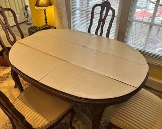 D17 - $250. Dining Table with 6 Chairs. 2 large leaves. Also has table pads. Very good vintage condition (although the chairs could be recovered). Top Measures 53.5" x 41" + 2 - 20" leaves.