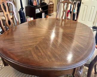 D17 - $250. Dining Table with 6 Chairs. 2 large leaves. Also has table pads. Very good vintage condition (although the chairs could be recovered). Top Measures 53.5" x 41" + 2 - 20" leaves.