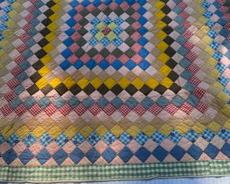 D61 - $95. Hand Pieced Quilt in Beautiful Condition. See Tape Measure on ground for an idea of size.