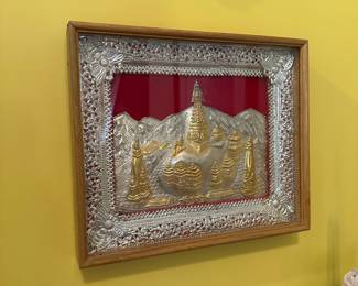 D83 - $25. Foil Art from Nepal. Measures 13" x 11" framed.