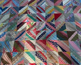 D60 - $125. Hand Pieced Quilt in Beautiful Condition. See Tape Measure on ground for an idea of size.