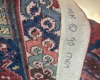 D169 - $250. LARGE hand woven area rug. The other side has significant fading. Needs Cleaned.