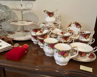 D80 - $150. Old Country Roses Royal Albert Bone China. 8 Tea Cups & Saucers, 2 Coffee Cups, 2 Demitasse Cups & Saucers, Soup Bowl & Saucer, 7 salad plates, 8 dessert plates, Creamer, 3 tiered tray.