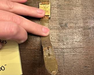 S13 - $600. Cartier Ladies Watch with Box & Paperwork. Currently not running - we have not tried to replace the battery.