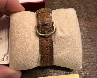 S13 - $600. Cartier Ladies Watch with Box & Paperwork. Currently not running - we have not tried to replace the battery.