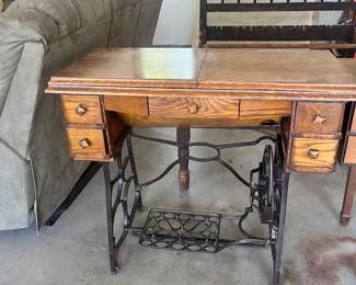 Treadle sewing machine cabinet