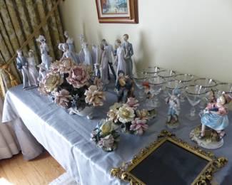 Bric-a-brac, Lladros, Capodimonte flowers, silver trim stemware, ornate gold frame