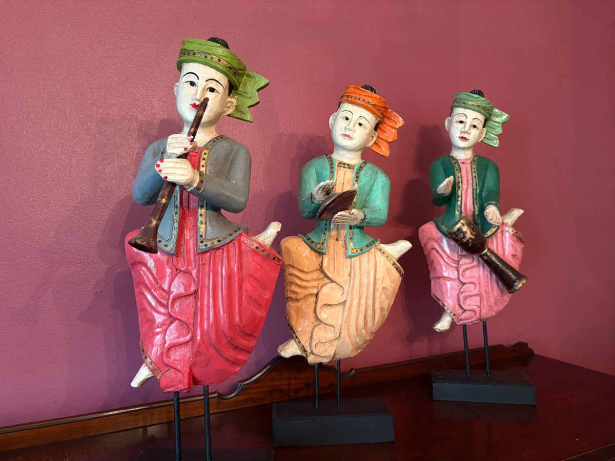 Carved dolls. Purchased in Taiwan 26" - 28" tall with the base.