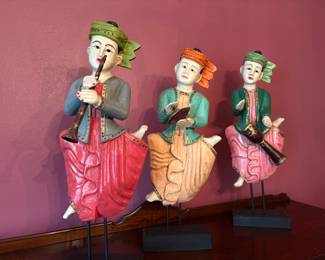 Carved dolls. Purchased in Taiwan 26" - 28" tall with the base.