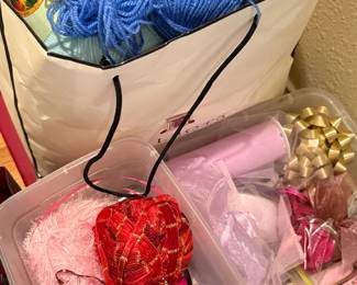 Bins of yarn and ribbons