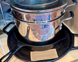 Assorted pots and cast-iron skillets