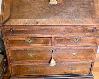 Antique secretary with brass accents