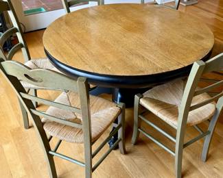 Round dining table with 6 ladder-back chairs from Italy