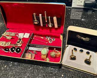 Assorted cufflinks and tie clips