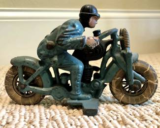 Cast iron motorcyclist statue