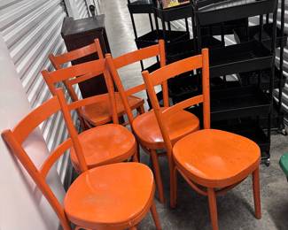 Total of eight orange chairs