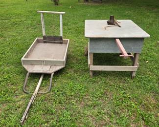 Unique hand made carts! One made from a dolly. The other has wood wheels and pull out red handle. Both roll.
