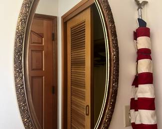 Gold Tone Framed Oval Wall Mirror