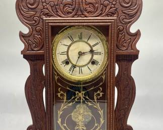 Antique Waterbury 8-Day Clock in Oak Case. Clock