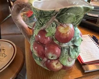 Ice tea or water pitcher apples