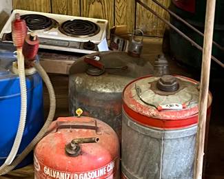 Lots of gas cans, big and small