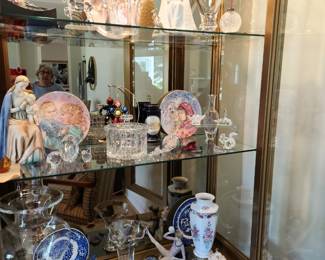 Beautiful Baker cabinet for display.It is gold and amazing.