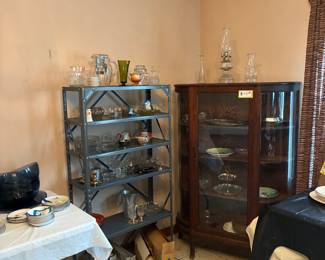 Antique glassware and china cabinet.