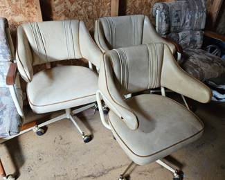 Three vintage swivel kitchen chairs $50