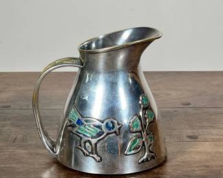 MEXICAN SILVER PLATE & TURQUOISE PITCHER | Silver plate pitcher with bird and flower relief with inlaid turquoise and lapis lazuli, marked on bottom - h. 5.25 x dia. 5 in