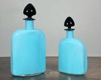 (2pc) ROBIN'S EGG BLUE VENETIAN GLASS BOTTLES |
Two matching bottles with black removable stoppers. - h. 11.5 x w. 5.5 in