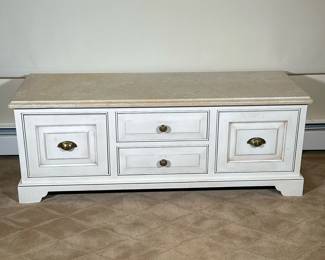 SUPERIOR WOODCRAFT STONE TOP LOW TABLE | Having beveled stone top over split-width drawers with brass pulls - h. 21 x w. 56 x d. 20 in