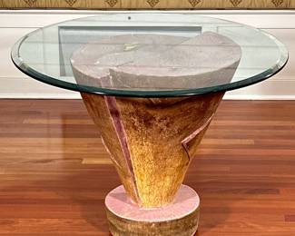 YOSHIO TAYLOR (American, b. 1945) FRAGMENT TABLE | Formerly a base of a large stone carving. Repurposed by the owner as a table, signed on top - h. 27 x dia. 35.5 in