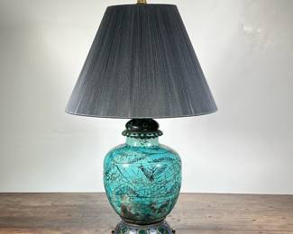 CRACKLE GLAZED & CHAMPLEVE ENAMELED LAMP | Possibly ceramic or glass vase shaped base with decorative etchings. Base and top of lamp resemble a stained glass design. Mid-Century. Brass pineapple finial. Delicate black pleated shade.
Dimensions: h. 29 x dia. 18 in
